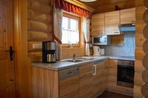Ferienhaus für Urlaubsvermietung in Blockhausbauweise - Küche