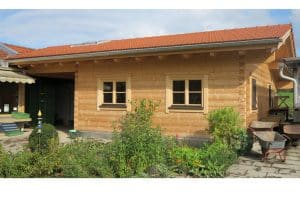 Blockhaus-Büro für eine Biogaertnerei